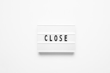 Lightbox with word close on white background