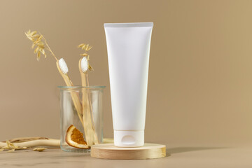 Organic oral care products set. Eco friendly still life with bio toothpaste, toothbrushes in glass...