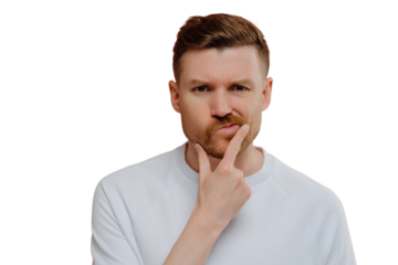 Photo of serious man holds chin purses lips makes decision with doubtful expression focused displeased at camera dressed in casual white t shirt isolated over white background. Let me thinks a bit