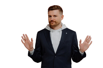 Strict red haired man in casual clothes spreading palms sideways and saying no