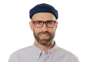 Close up portrait of smiling unshaven male, rejoices good news, wears hat and shirt, looks with eyes full of joy isolated over background. European man with bristle ready for date with girlfriend