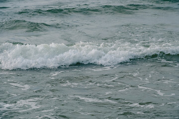 Naklejka na ściany i meble Undulating Baltic Sea.Waves during small storm.