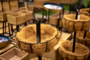 flower pot made of coconut husk in supermarket display