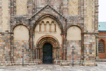 Obraz premium Entrance of cathedral in picturesque village Ribe In Southern Jutland in Denmark. Oldest city of Scandinavia