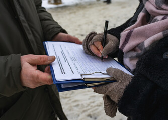 Activist collecting signatures for a petition