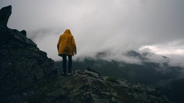 Adventure Traveler Hiking In The Rain