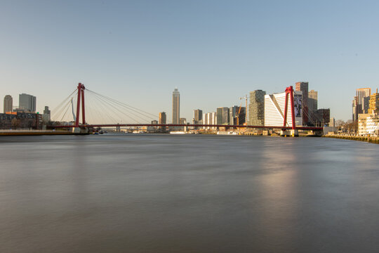 The Willemsbrug over the Nieuwe Maas in the center of Rotterdam with a slow shutter speed © R