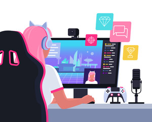 Cute gamer girl playing video games online and live streaming © elenabsl