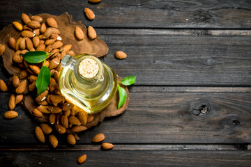 Almond oil with leaves.