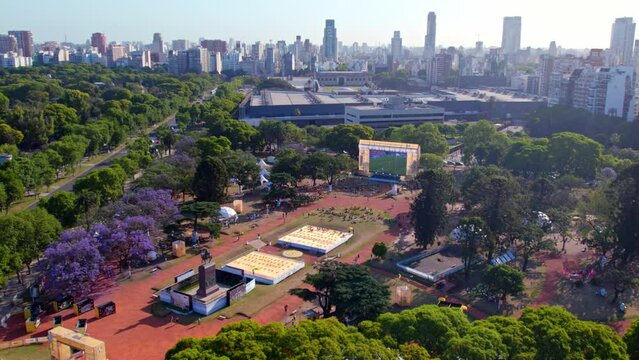 Dolly in aerial view of a World Cup soccer match at the Intendente Seeber square in Palermo, Buenos Aires, Argentina.