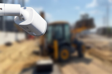 security CCTV camera or surveillance system with construction site on blurry background.
