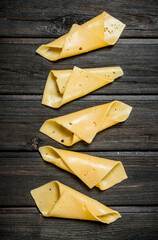 Thin slices of cheese.