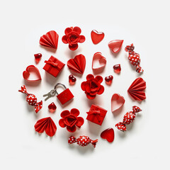 Round Valentine's day composition with red hearts, flowers, lock and candies, top view