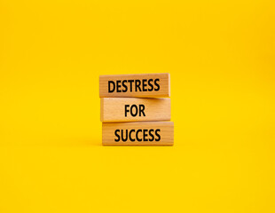 Destress for Success symbol. Concept words Destress for Success on wooden blocks. Beautiful yellow background. Business and Destress for Success concept. Copy space.
