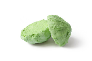 Marshmallow on white. Green divided marshmallow on a white background. Two halves of marshmallows
