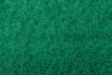Green scouring pad close up texture background