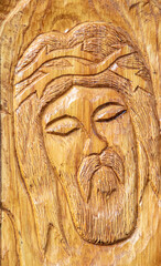 Fototapeta na wymiar Wooden sculpture with the face of Jesus Christ at Dumbrava monastery - Romania