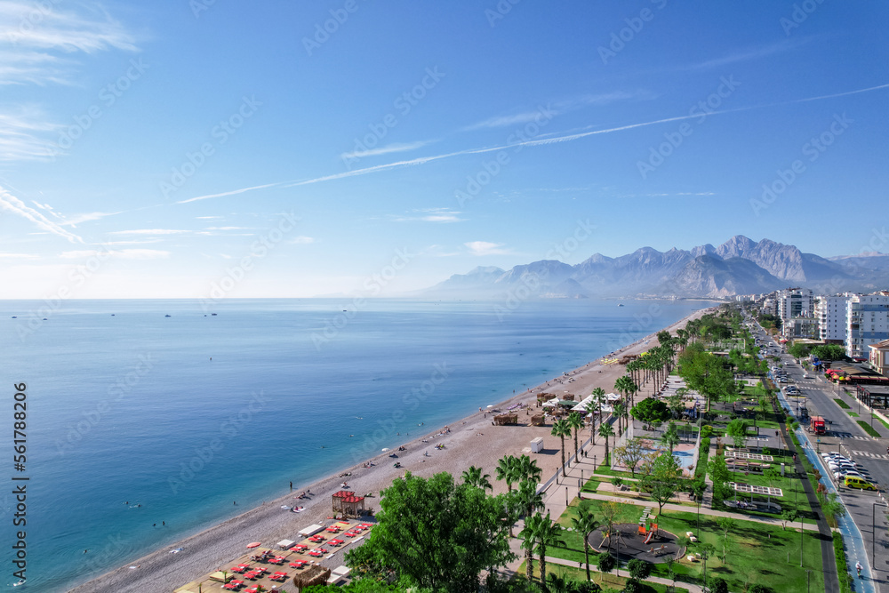 Wall mural aerial view of beautiful blue gulf and konyaalti beach in popular resort city antalya, turkey.