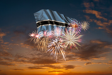 Flag of Botswana and Holiday fireworks in sky