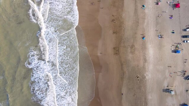Drone shot of a beach from above in Caril&oacute;, Argentina in the summer.