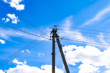 Power electric pole with line wire on colored background close up