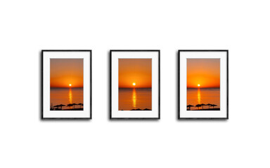 Three black frames set with pictures of colorful sunrise over the sea isolated on white wall, 3D illustration
