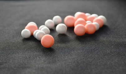 colorful foam seed for absorb delivery stuff arranging on black background 