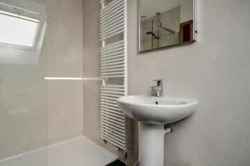 Shower room with towel rail