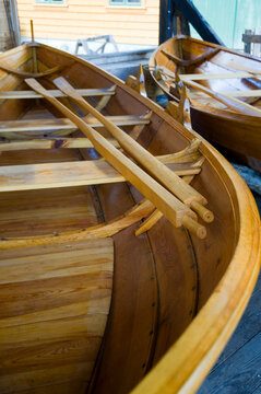 Traditionally built wooden rowing boat with oars at the marine museum in Norheimsund, Western Norway.