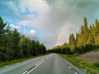 rainbow over the road , image taken in sweden, scandinavia, , europe