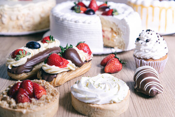 fruit cake strawberry grape with wooden background