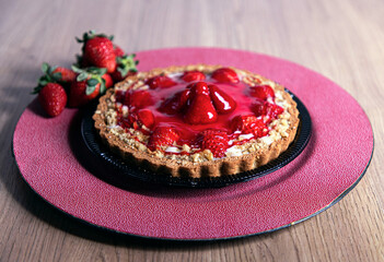 fruit cake strawberry grape with wooden background