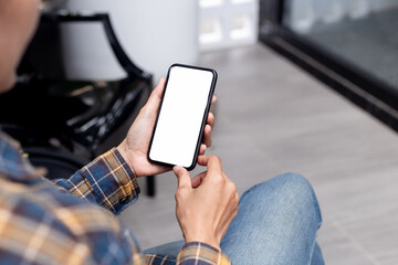 cell phone blank white screen mockup.hand holding texting using mobile on desk at office.background empty space for advertise.work people contact marketing business,technology