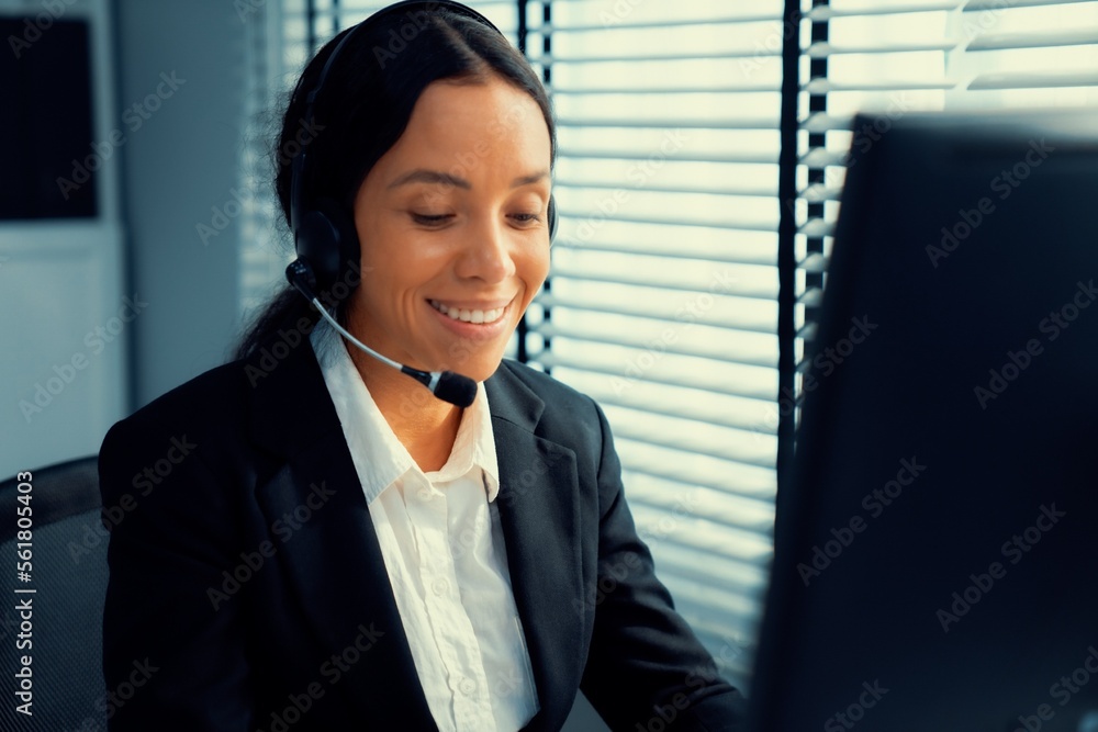 Aufkleber competent female operator working on computer and talking with clients. concept relevant to both cal