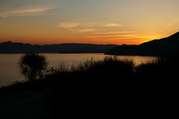 Sunset moody night seascape with a view on the bay.
