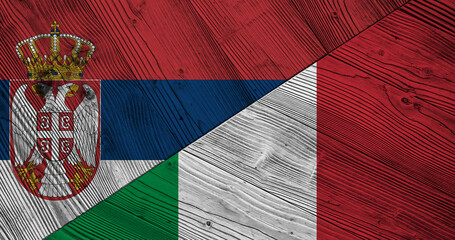 Background with flag of Serbia and Italy on wooden divided table. 3d illustration