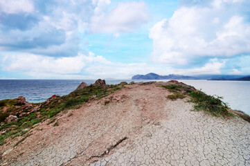 Fototapeta na wymiar Landscape with hills on the sea shore.