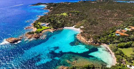 Fototapete Rund Italy summer holidyas . Sardegna island - stunning Emerald coast (Costa Smeralda) with beautiful beaches. aerial view of small Romazzino beach . © Freesurf