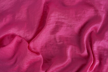 Pink elegant silk background. Close up. Whole background