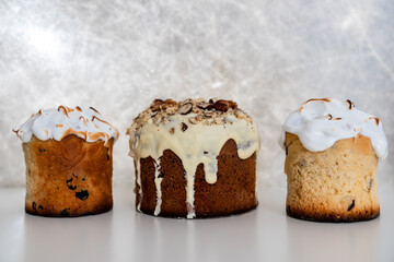 Three homemade Easter cakes on a white background. An important Christian holiday