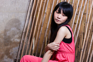 Taiwanese Chinese young woman looking sad