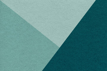 Texture of craft emerald and cyan shade color paper background, macro. Vntage abstract green...