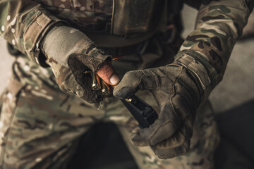 Close up picture of a soldier with weapon