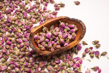 Fototapeta na wymiar Dried damask roses for natural herbal cosmetics.