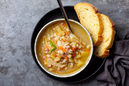 South Tyrolean barley soup Gerstsuppe, Graupensuppe, made with smoked pancetta or bacon, calery, fennel, potato, onion. Fresh bread.  Or Zuppa d'orzo.