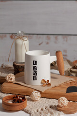 A white cup with the inscription Love