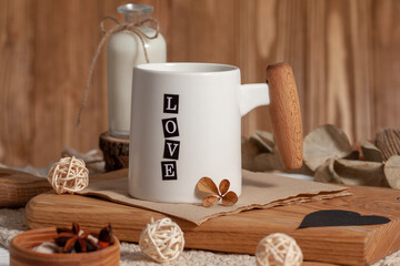 A white cup with the inscription Love