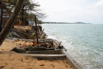 broken beach access after strong storm and high waves on Koh Samui Mae Nam Beach