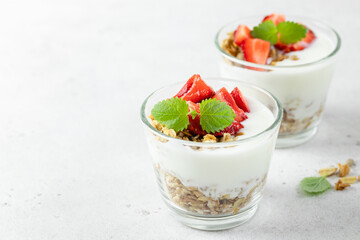 Strawberry granola greek yogurt parfait. Top view, copy space,flat lay.