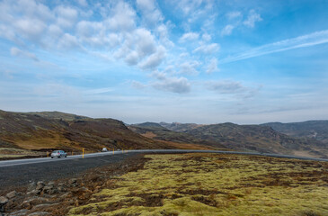 Iceland Landscape with Mountain, Blue Sky and Road.